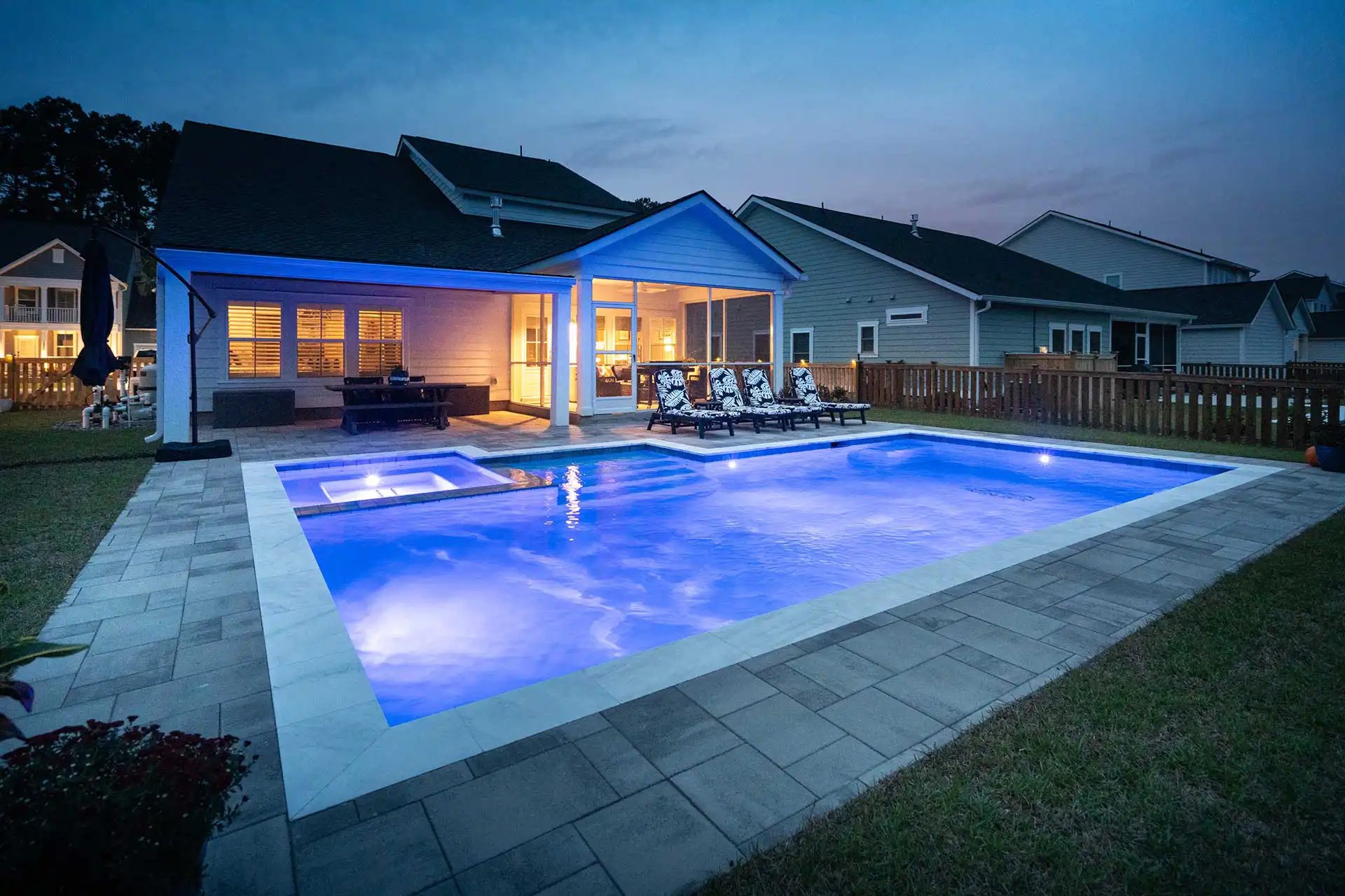Geometric pool and spa at dusk, Heritage Pools project