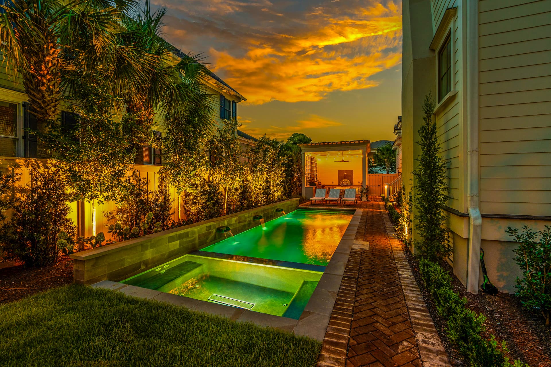 Lit side-yard lap pool, Heritage Pools project